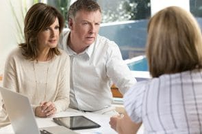 Worried mature Couple in Meeting With Mediator