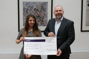 Simon O'Loughlin presenting cheque to CBIT