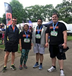 Housing team runs Windsor half Marathon 2017_with medals